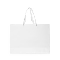 Paper shopping bag isolated on white. Mock up for design