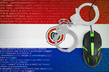 Paraguay flag  and handcuffed computer mouse. Combating computer crime, hackers and piracy