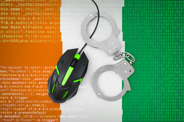 Ivory Coast flag  and handcuffed computer mouse. Combating computer crime, hackers and piracy