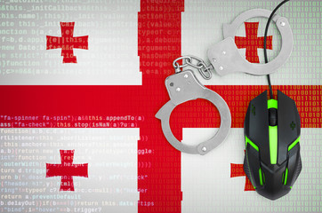 Georgia flag  and handcuffed computer mouse. Combating computer crime, hackers and piracy