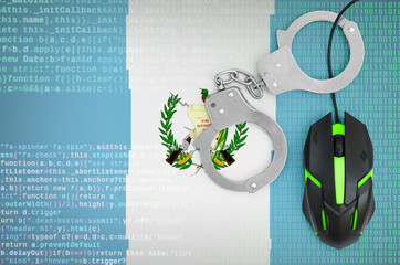 Guatemala flag  and handcuffed computer mouse. Combating computer crime, hackers and piracy