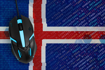 Iceland flag  and computer mouse. Digital threat, illegal actions on the Internet
