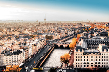 Paris, France - Seine river aerial cityscape in autumn colors. Eiffel Tower and La Defense in the...