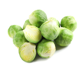 Fototapeta premium Pile of fresh Brussels sprouts isolated on white