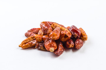 heap of piri piri peppers isolated on white background