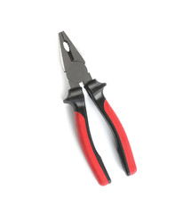 New pliers on white background, top view. Construction tools