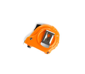 New measuring tape on white background, top view. Construction tools