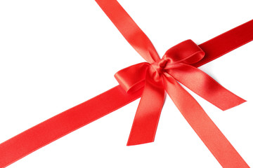 Red ribbon with bow on white background. Festive decoration