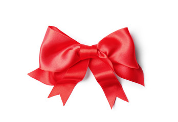Beautiful red ribbon bow on white background. Festive decoration