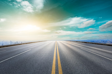 Panoramic city skyline and buildings with empty asphalt road in Shanghai