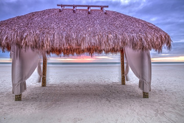 Tiki hut shelter on Tigertail Beach on Marco Island, Florida