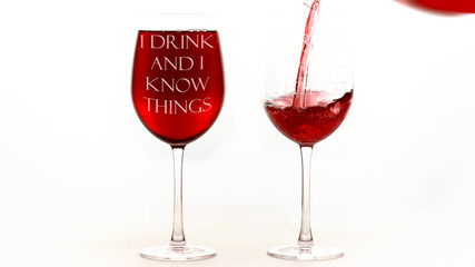 Red wine glasses with I drink and I know things text on white background.