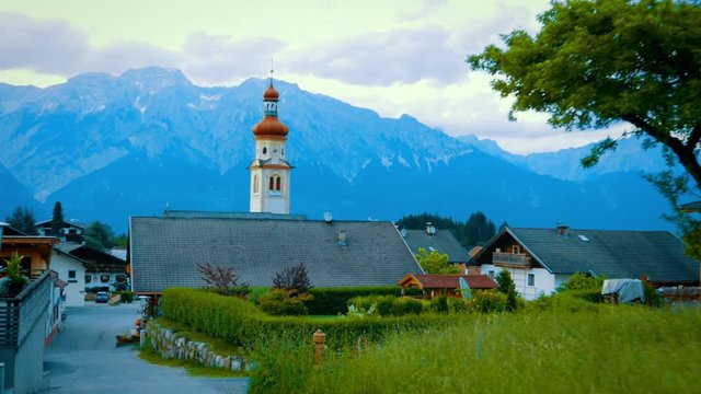 Beautiful summer view to Alps in small village in Tirol, Austria