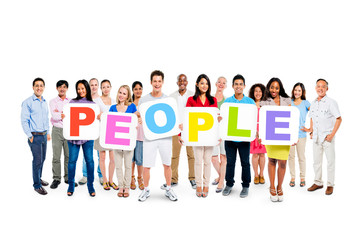Obraz premium A Large Group of Colorful Diverse People Holding White Placards with Letters Forming the Word 