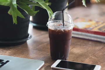 Ice black coffee on table