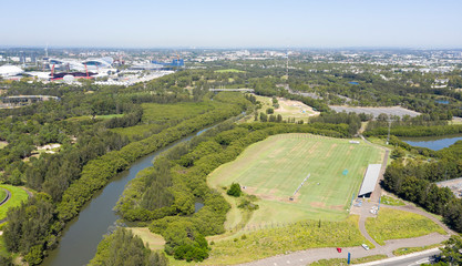 Fototapeta premium Sydney Olympic archers park and Haslams creek, an offshoot of the Parramatta river.
