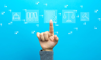 Compliance theme with hand on a blue background