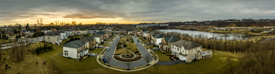 Aerial panorama of American luxury real estate neighborhood in Pikesville Maryland with single...
