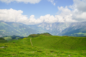 Alpine peaks landskape background. Jungfrau, Bernese highland. Alps, tourism, journey, hiking.