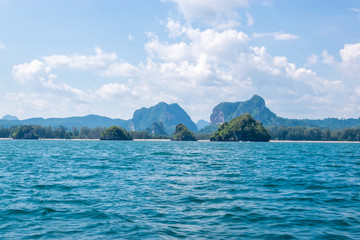 A Thai long tail boat on the beach of Andaman sea located at Krabi near Phuket, Thailand
