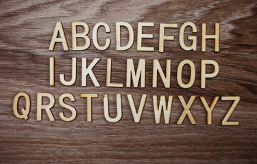 Fototapeta premium A-Z alphabet on wooden background