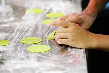 Chef Making Fresh Homemade Pasta, cooking Italian pasta, or noodles