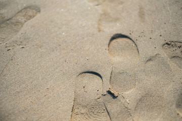 Fototapeta na wymiar Footprints on the sands of the morning air..