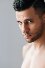 Close up portrait of handsome shirtless man