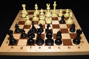 Chechered board and the pawns for hobby backdrop