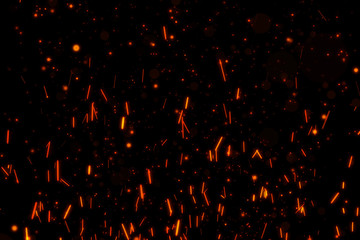 Naklejka na ściany i meble Fire particles isolated on black background overlay. Put it over your image in screen mode.