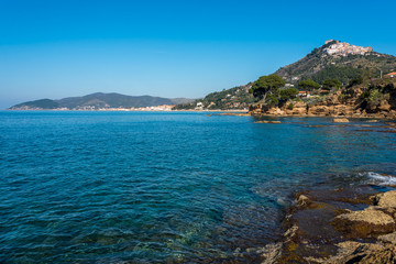 Obraz premium Blue Mediterranean Sea on the Rocky Southern Italian Coast on a Sunny Day