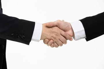 Businessmen handshake together..