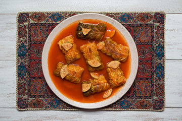 Indian cabbage rolls in curry sauce. Top view. 