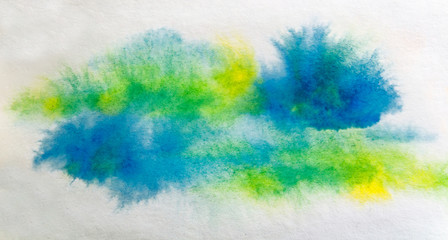 Hand draw watercolor texture splash on paper in blue and green color
