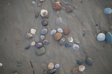 Naklejka na ściany i meble Pebbles on the beach