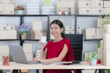 Young lady working at home office