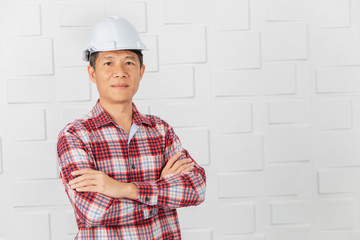 Asian architect at construction site office