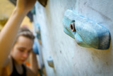 Teenage Boy Training On Climbing Wall