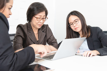 Asian woman working