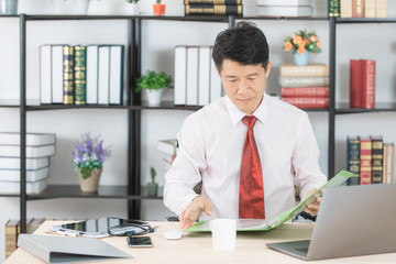 Fototapeta premium Asian business man at office