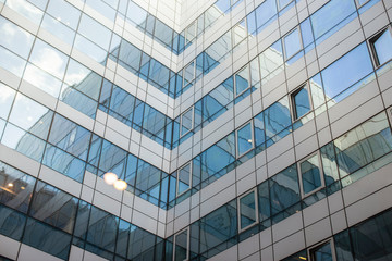 Fototapeta na wymiar abstract texture of blue glass modern building skyscrapers