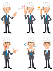 ヘルメット被ったスーツの男性 建築現場