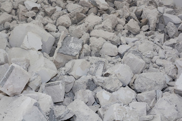 Fragments of used broken concrete. Background,the consequences of the earthquake