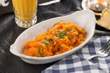 cabbage stew with glass of beer served on the table for lunch