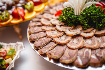 plate of meat cuts on the table