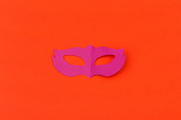 cut out colored paper figures for the holiday Mardi Gras, colour background