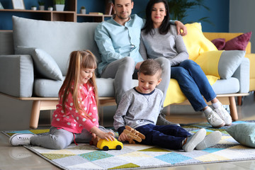 Portrait of happy family at home