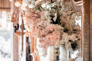 rustic wedding decorations with flowers and candles. banquet decor. picture with soft focus