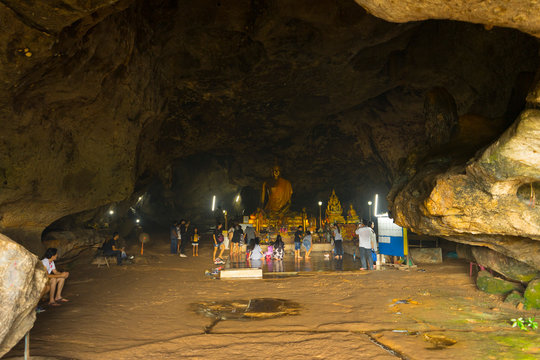 Many people are worshiping sacred things in cave name Tham Krasae in Kanchanaburi