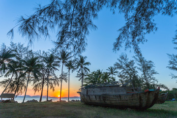 The old unseen boat sugar tanker made by large teak wood parking on Kwang beach Krabi Thailand